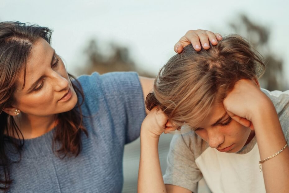 Mother comforting her anxious child and listening with empathy